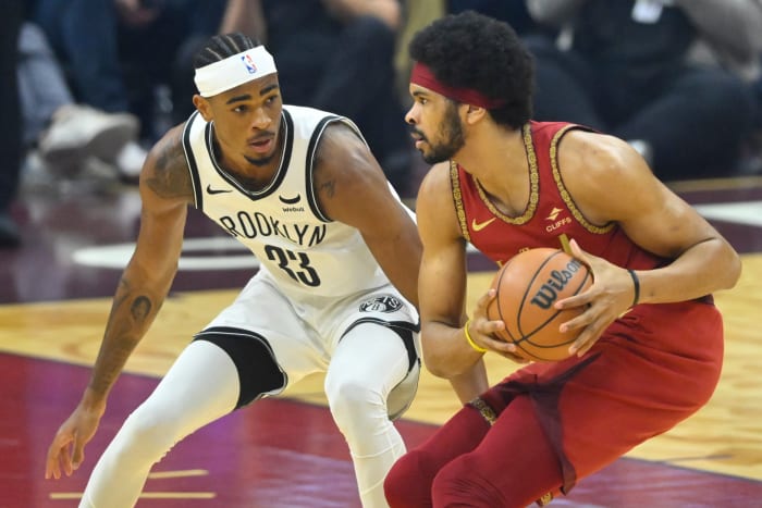 Mar 10, 2024; Cleveland, Ohio, USA; Brooklyn Nets center Nic Claxton (33) defends Cleveland Cavaliers center Jarrett Allen (31) in the first quarter at Rocket Mortgage FieldHouse. Mandatory Credit: David Richard-USA TODAY Sports